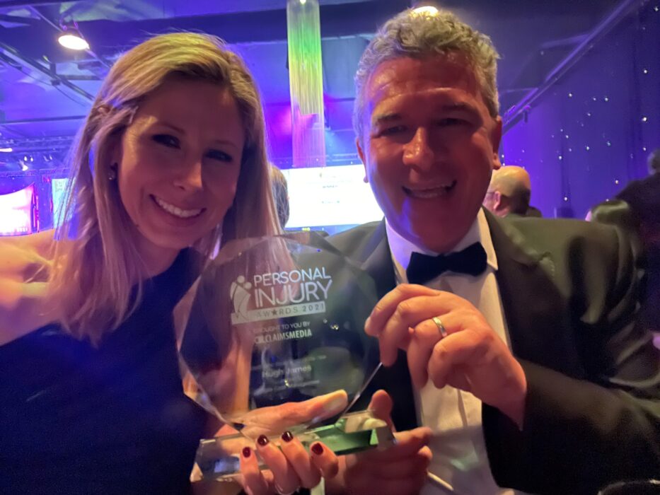 Cari Sowden-Taylor and Ciaran McCabe holding the Catastrophic Injury Team of the Year award at the Claims Media Personal Injury Awards 2021
