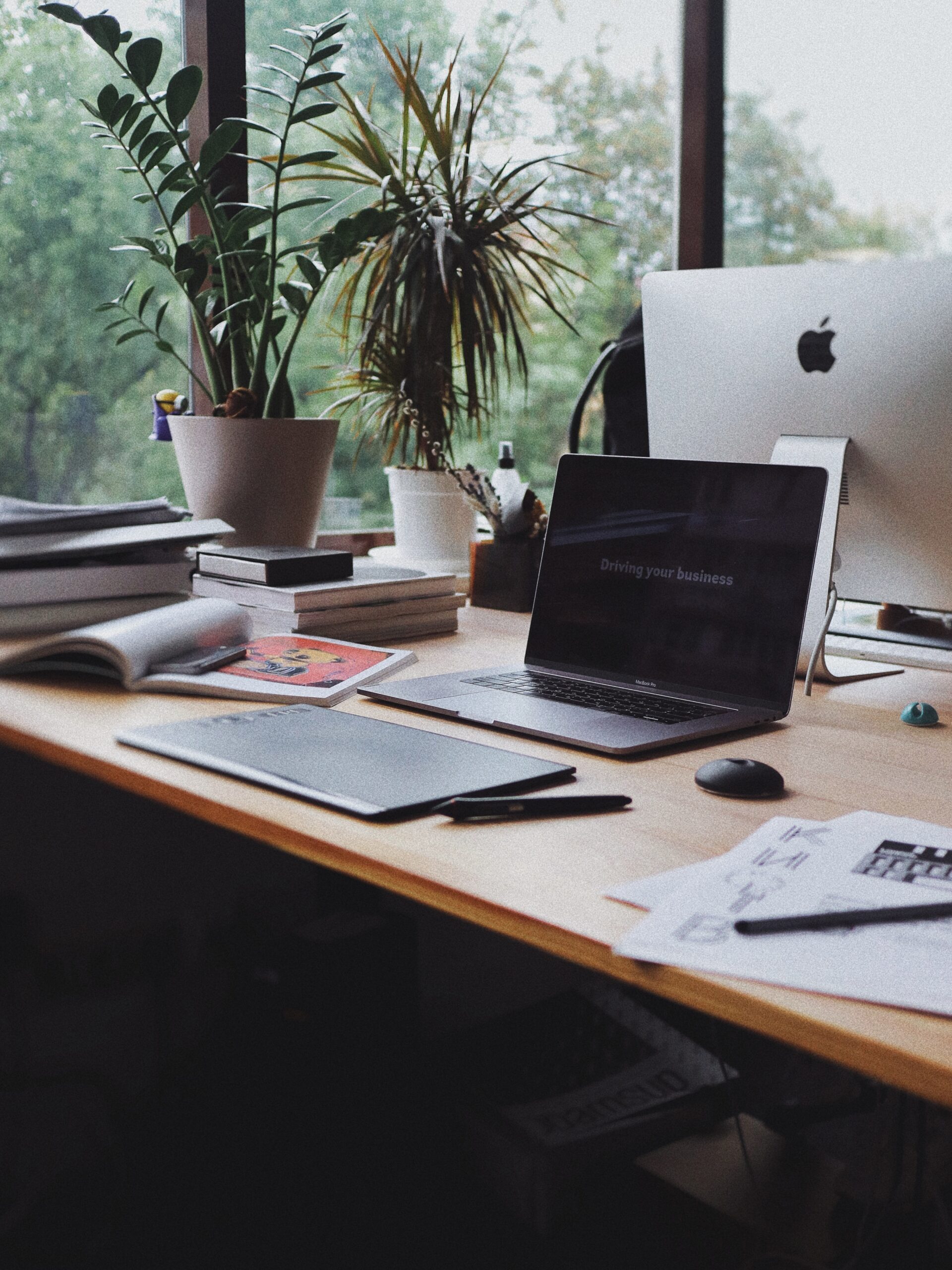 Laptop on desk with papers | Hugh James Laptop on desk with papers | Hugh James