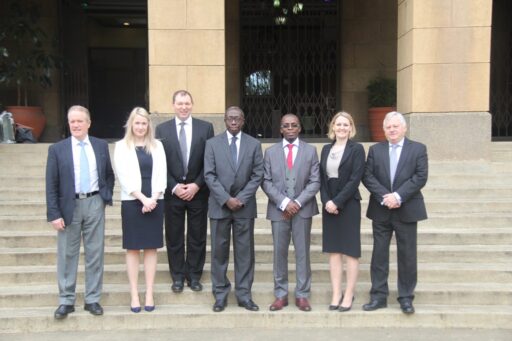 From left to right: Malcolm Evans, Lyndsey Gordon-Webb, Andrew Davies, Mr Justice William Ouko, Ronald Onyango, Gwen Evans, Gareth Morgan.