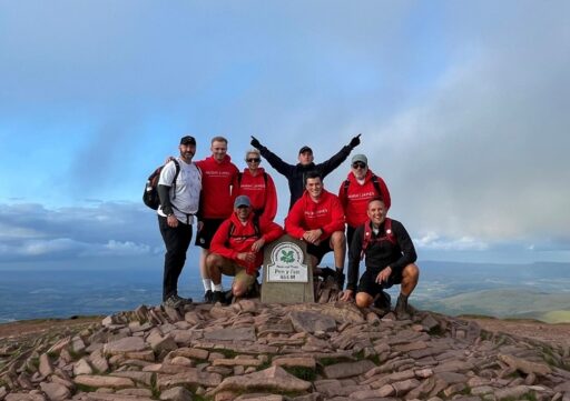 Hugh James Serious Injury Team at the top of Pen y Fan for the Welsh 3 Peaks Challenge