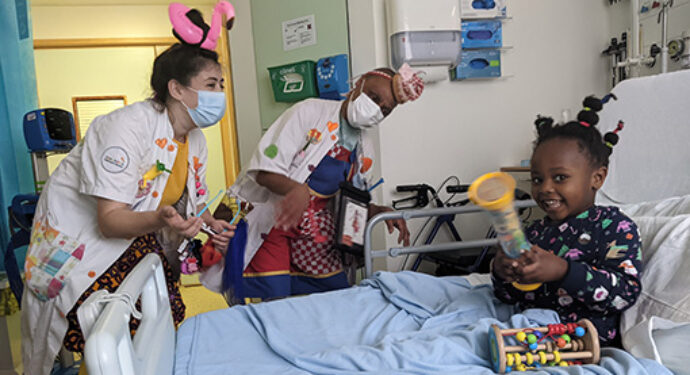 Theodora Giggle Doctors with child patient