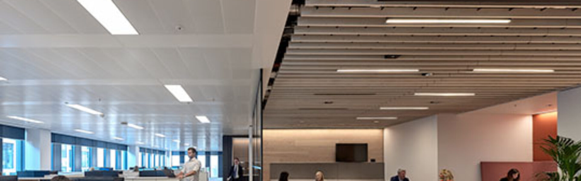 members of Hugh James staff working around the 2 Central Square Cardiff head office