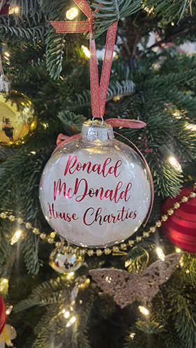 The final ornament placed by Bristol’s Right Honourable Lord Mayor, Chancellor Paul Goggin, which reads "Ronald McDonald House Charities"