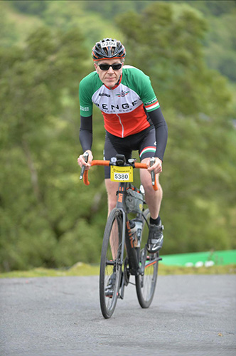 Barry Covington cycling wearing a Penge cycle club jersey