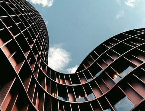 A low-angle photography of brown building during daytime